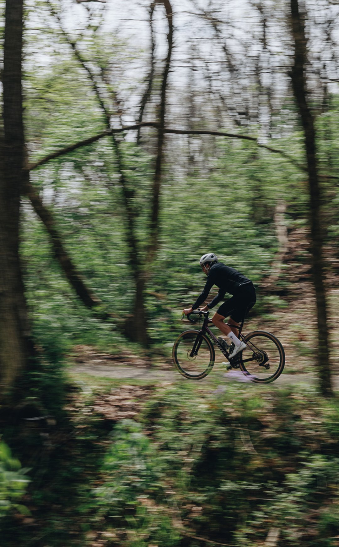 Gravel rider on a forest trail on a Specialized Diverge, available at Spoke N Trail Noosaville