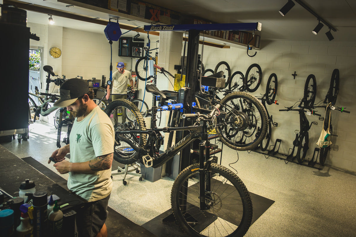 Spoke N Trail workshop bench with a bike in the repair stand