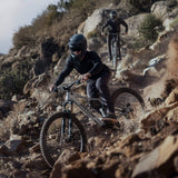 Amflow PX Carbon riders on rocky trail